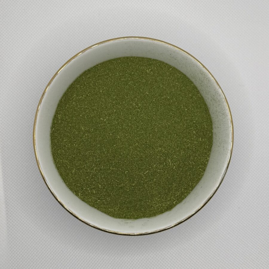 Bowl of green gotukola leaf powder