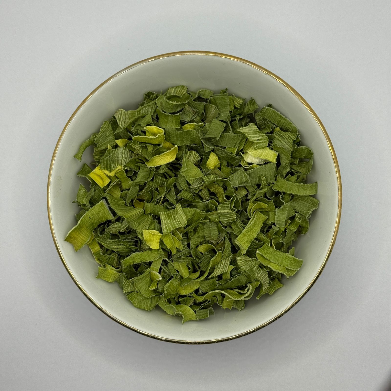 Bowl of dehydrated leek pieces